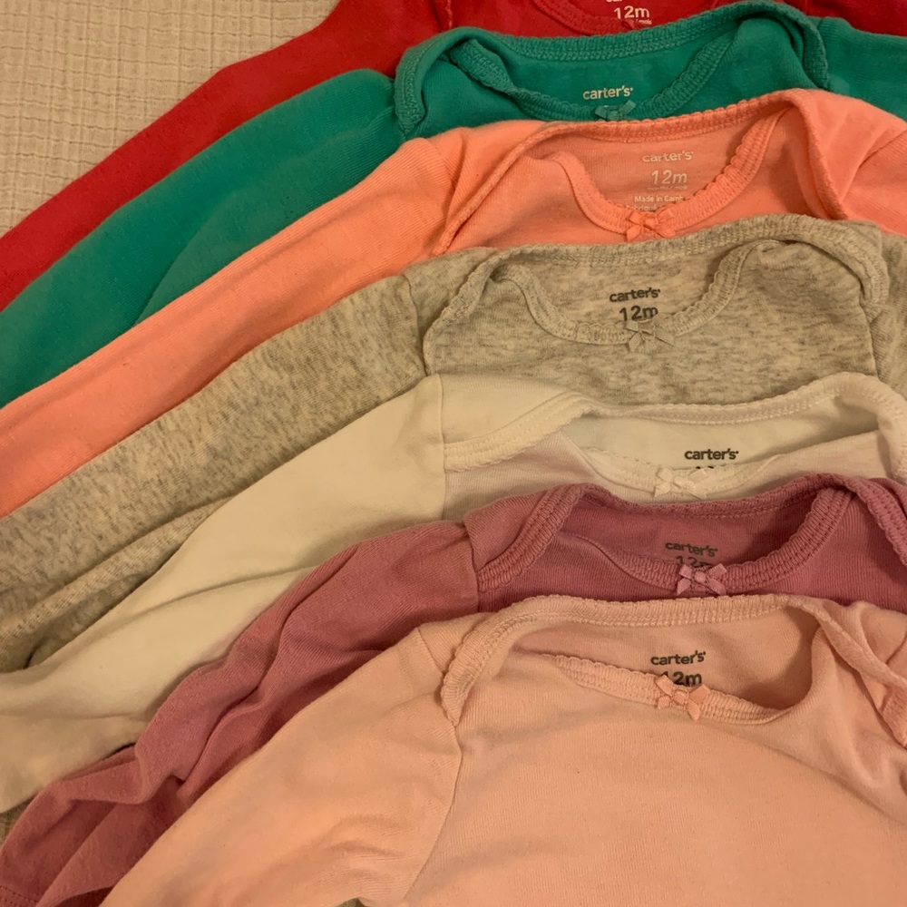 6-pack Carter’s onesies - 12 month